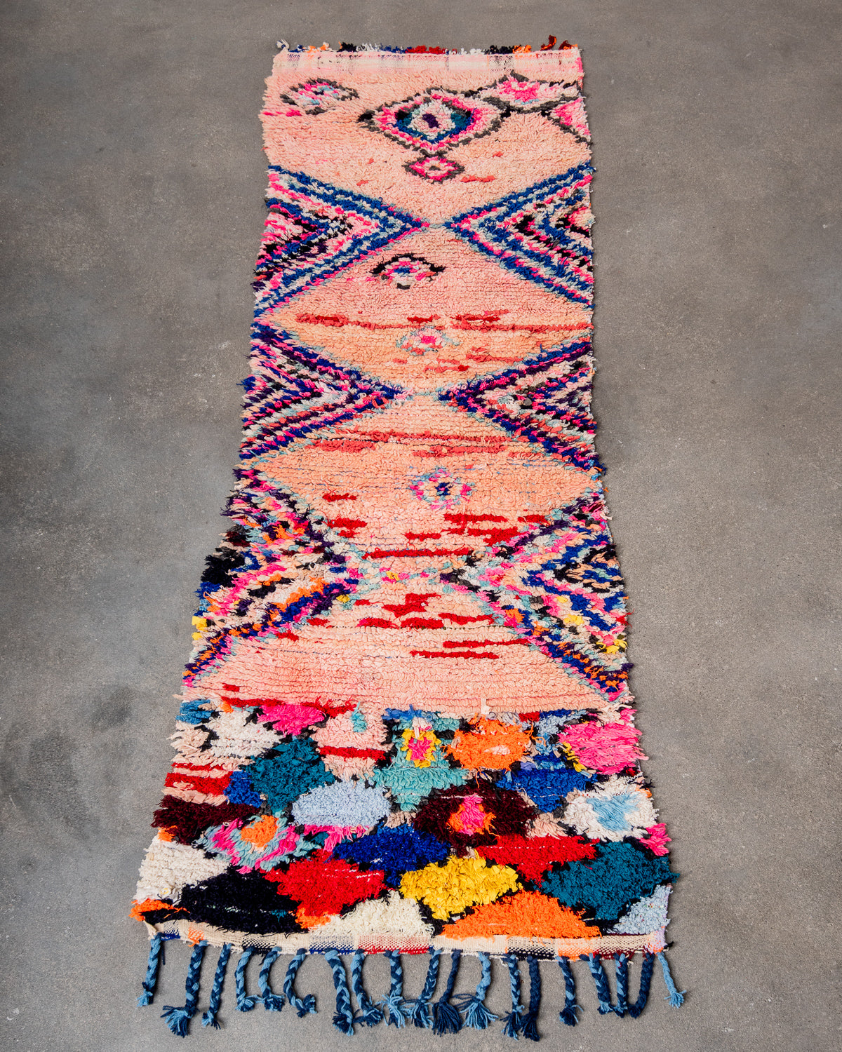 Modern designer vintage handcrafted Berber rug from Morocco. Boucherouite runner rug with beautiful colors and patterns.
